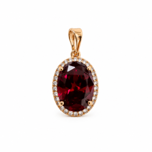 gold ruby halo pendant on white