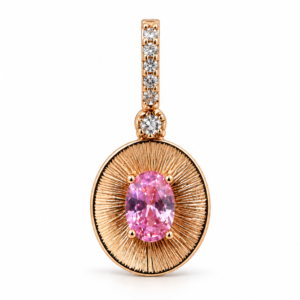 rose gold sunburst pendant with pink gemstone
